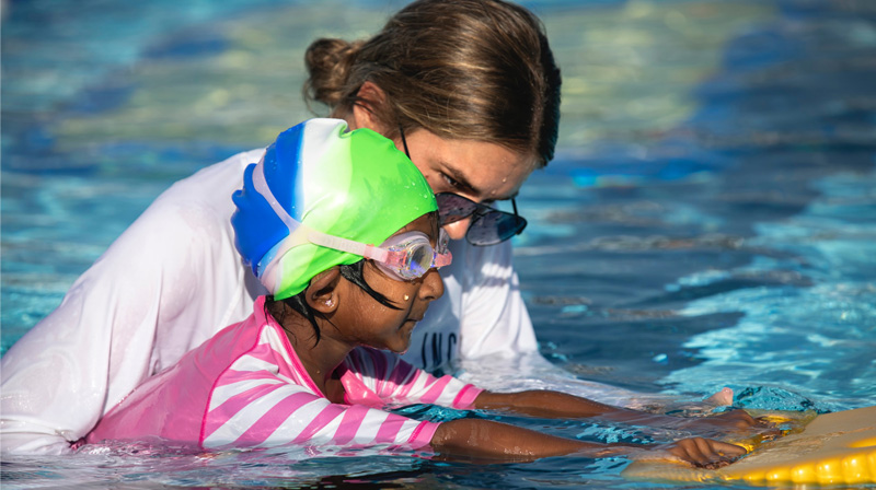 Featured image for “High 5, Inc. Wades In for World’s Largest Swim Lesson”